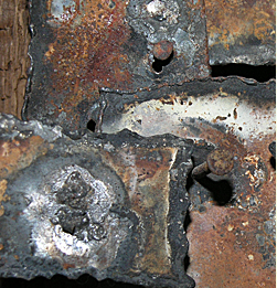 Metal textures of welding and rusted nails make a beautiful wall sculpture.